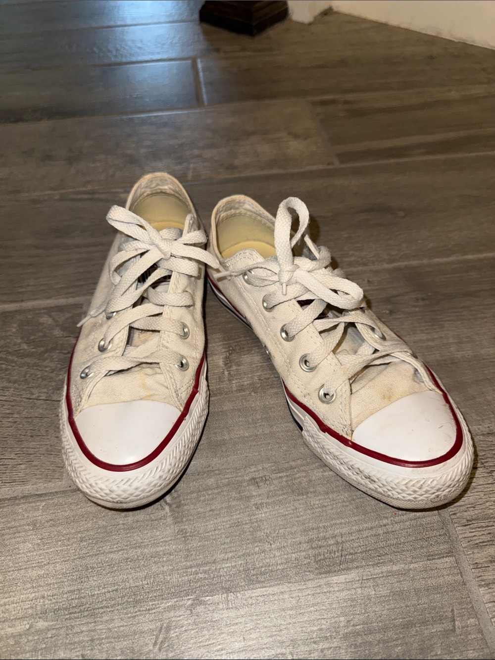 Converse Women’s Low-Top Canvas Sneakers in White with Red Trim